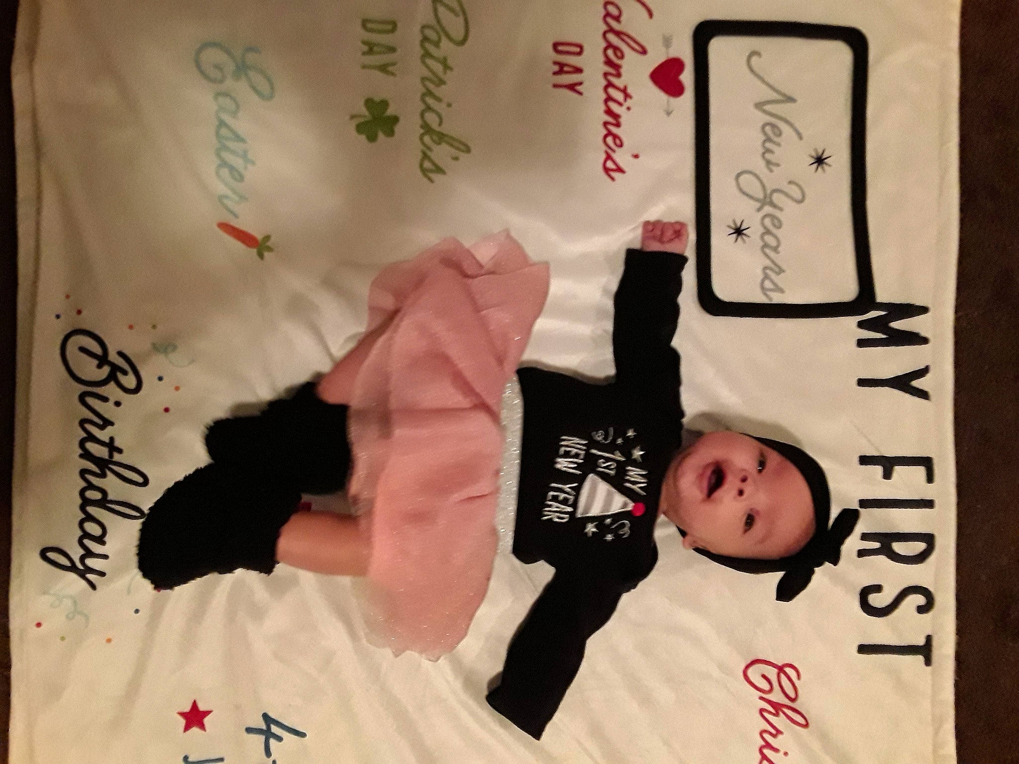 Layla is registered to the contest to win money with this photo: contact_sport, font, karate, linens, paper, person, room, sleeve, toddler