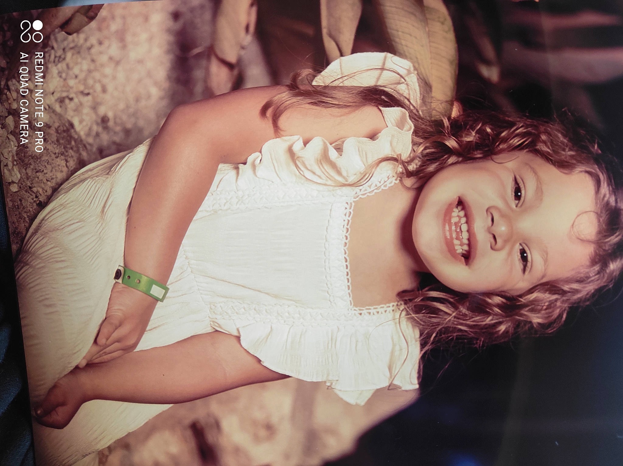 Iliana participe au concours pour gagner de l'argent avec cette photo : arm, black_hair, cool, dress, eye, eyelash, face, flash_photography, gesture, grass, hand, happy, human_body, joy, lip, muscle, neck, person, shoulder, skin