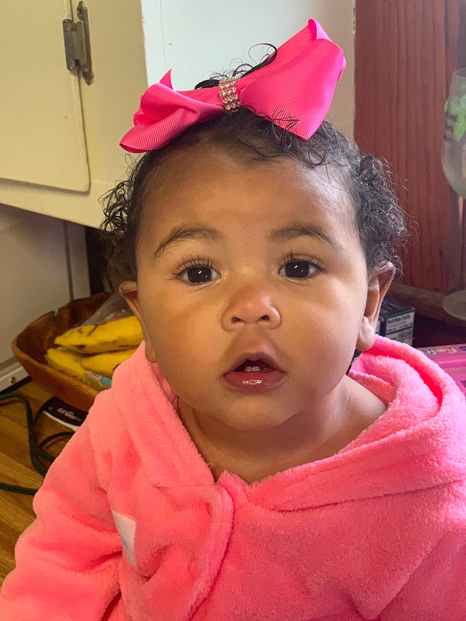 Annsley is registered to the contest to win money with this photo: cheek, child, ear, face, fashion_accessory, forehead, hair_accessory, head, headband, headgear, lip, person, pink, skin, smile, surprise, toddler