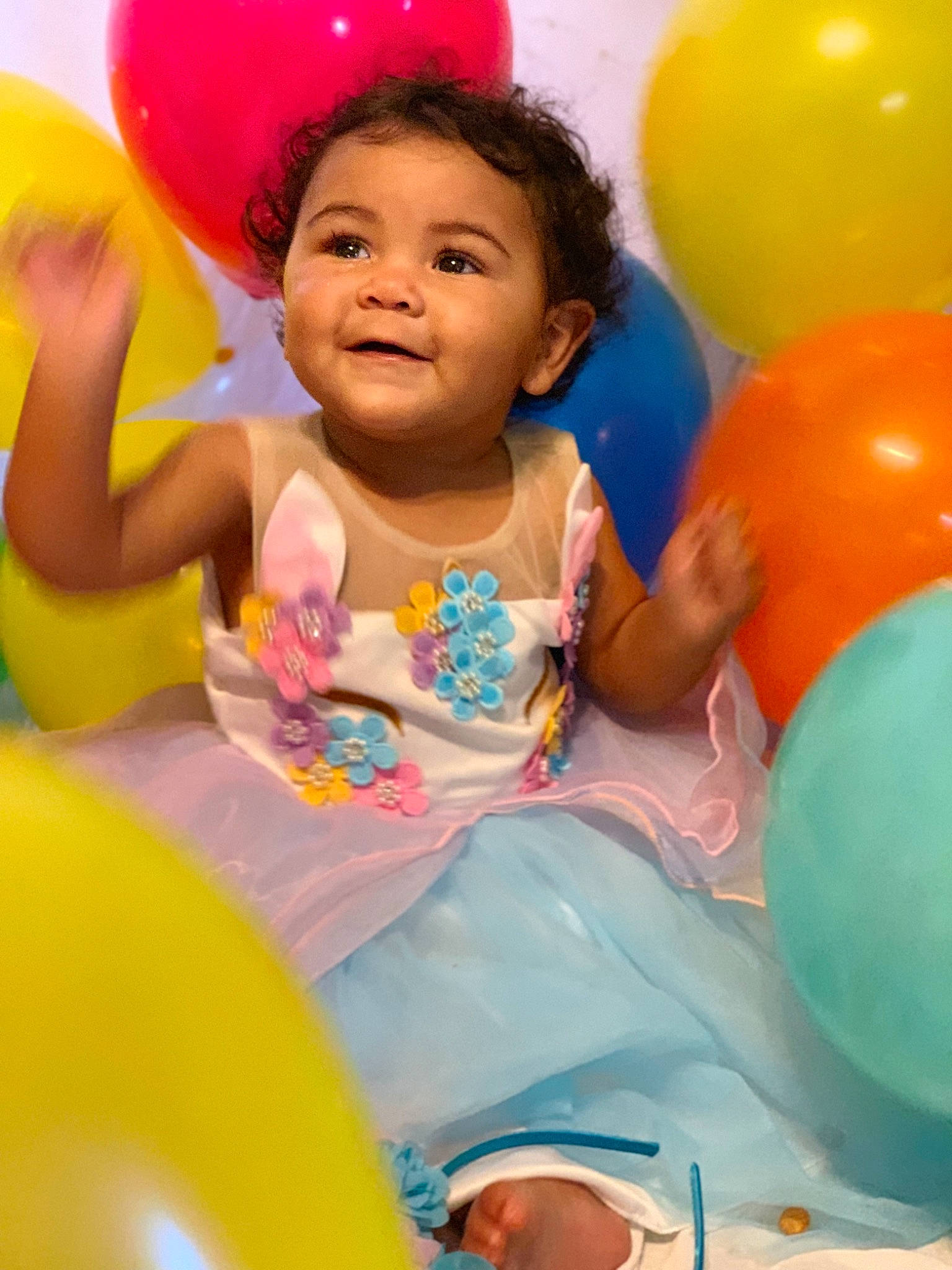 Annsley joined the competition — help win amazing prizes! baby, baby_playing_with_toys, balloon, child, fun, happy, joy, leisure, party, party_supply, person, play, product, smile, toddler, toy, yellow