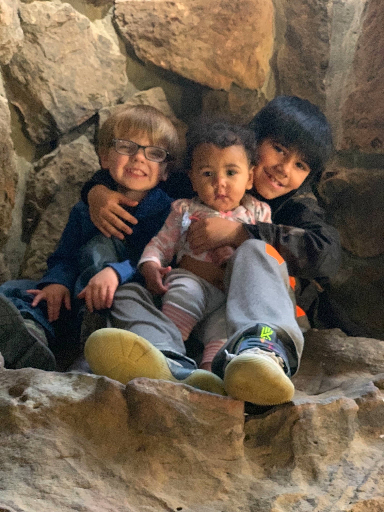 Aiden is registered to the contest to win money with this photo: adaptation, adventure, child, formation, fun, geological_phenomenon, geology, joy, leisure, people, person, recreation, rock, smile, vacation