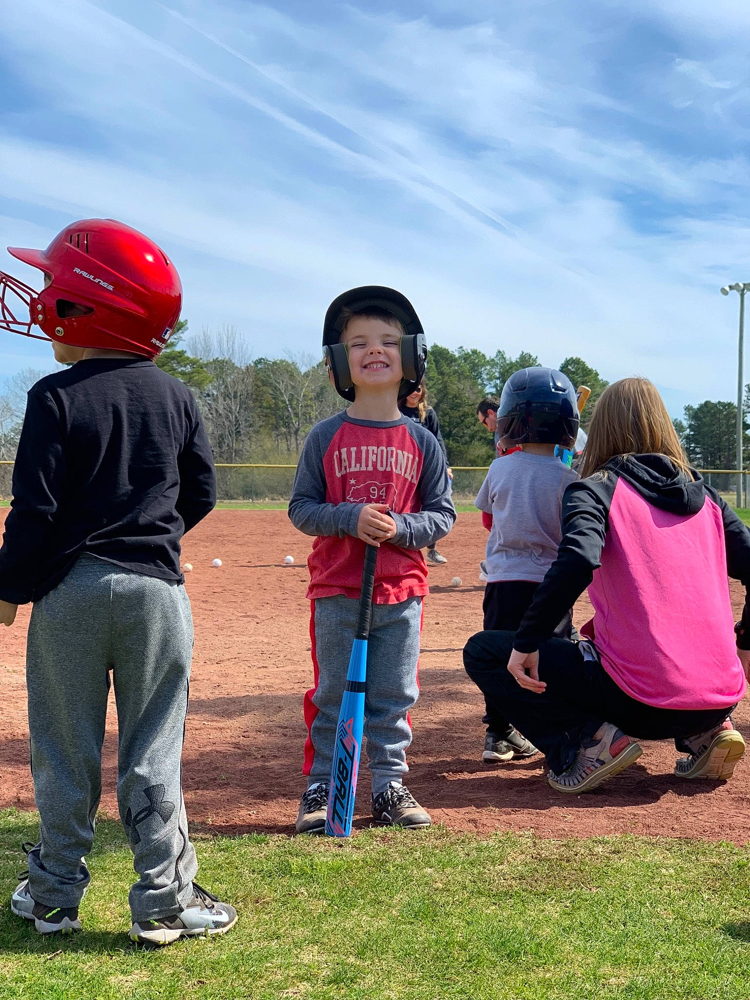 Declan is registered to the contest to win money with this photo: child, community, fun, games, grassland, headwear, joy, leisure, people, person, plant, play, recreation, style, team, tourism, tree, vacation