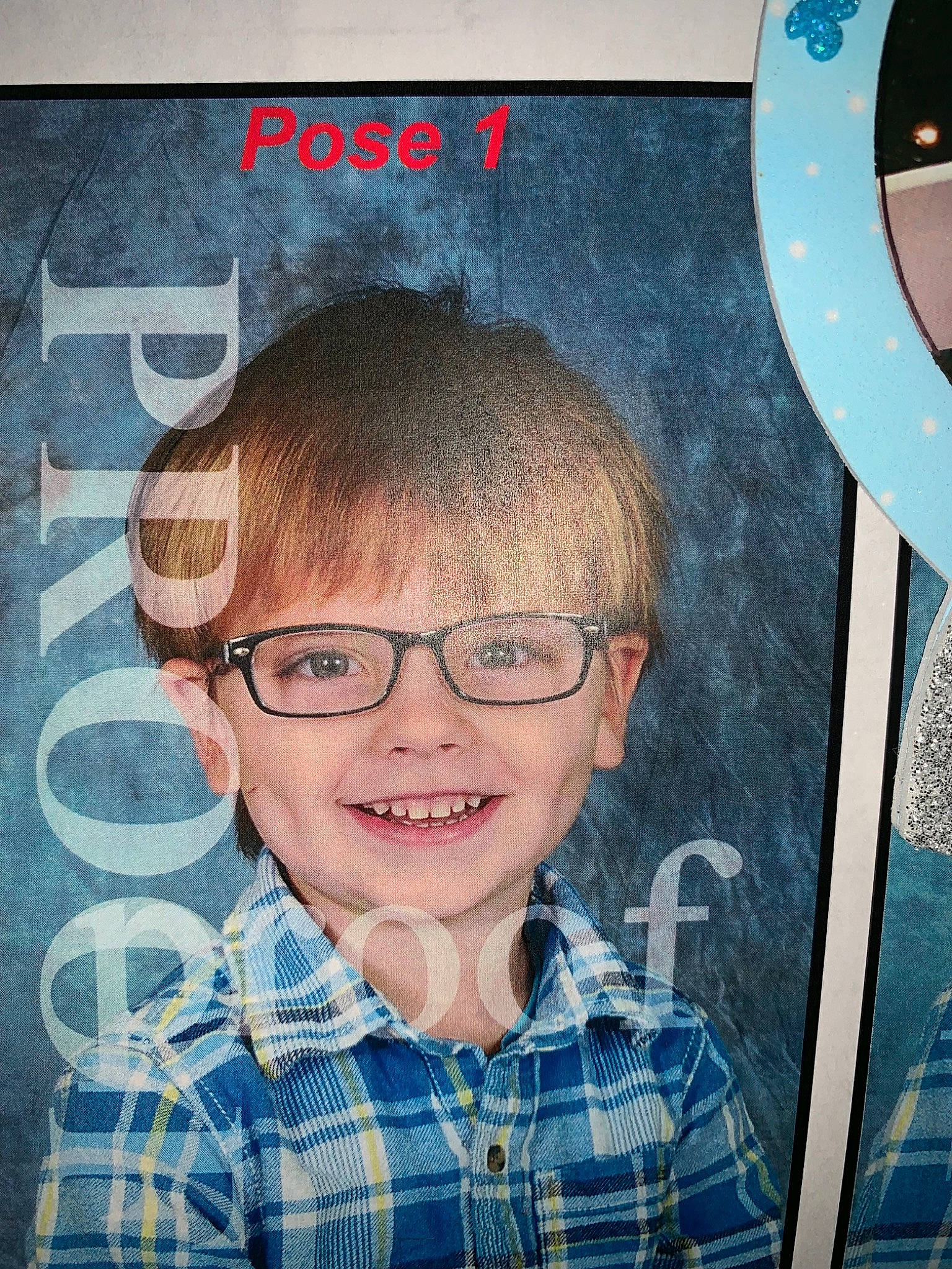 Declan is registered to the contest to win money with this photo: child, chin, cool, design, ear, eyewear, face, forehead, glasses, hair, hairstyle, head, illustration, joy, pattern, person, photo_caption, photography, selfie, smile