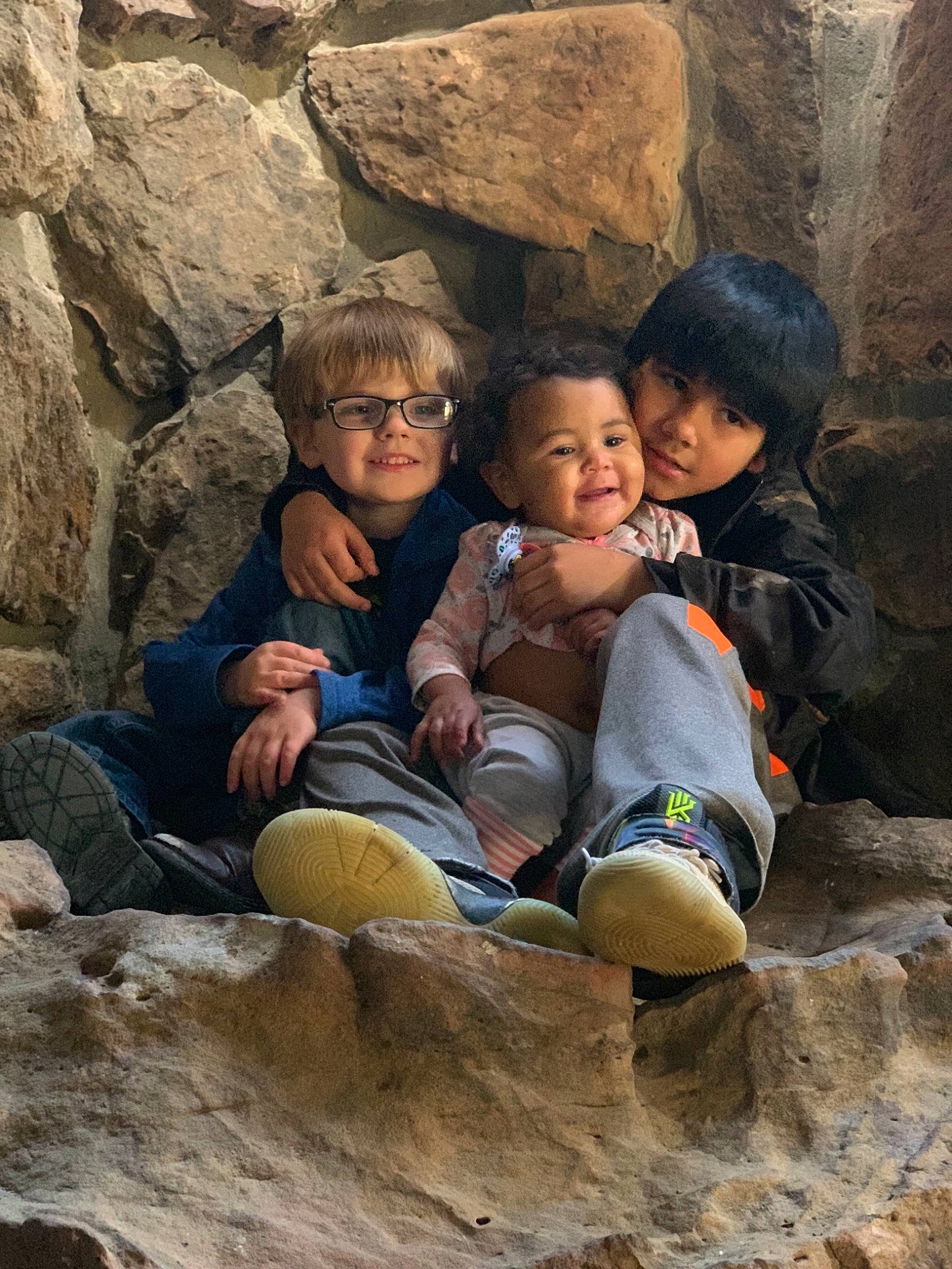 Declan is registered to the contest to win money with this photo: adventure, child, fawn, formation, fun, geological_phenomenon, geology, joy, leisure, people, person, recreation, rock, smile, tree, vacation