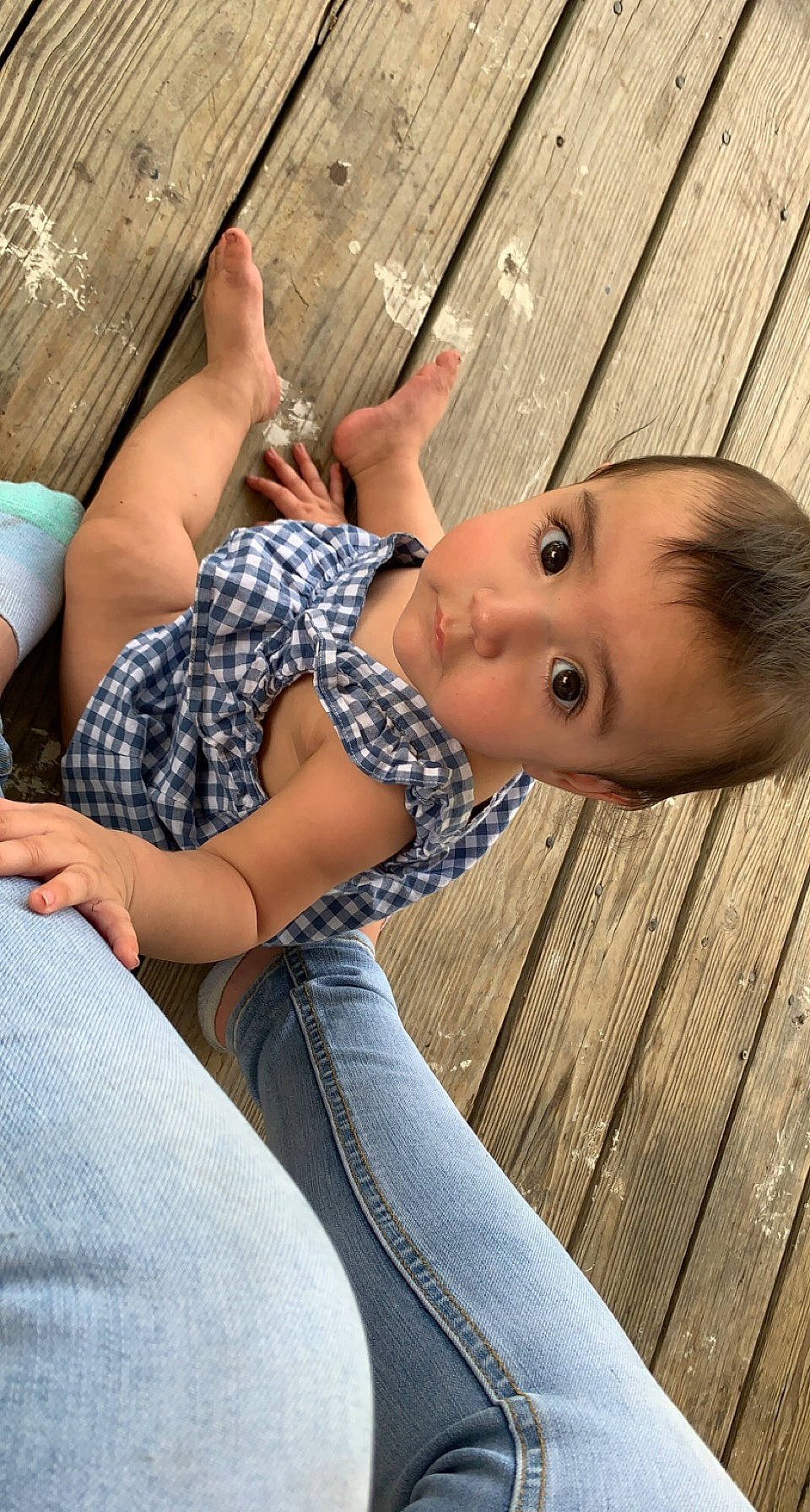 Rosalee is registered to the contest to win money with this photo: denim, elbow, finger, fun, grass, hand, happy, human_body, human_leg, joint, leg, leisure, pattern, person, plant, sitting, skin, thigh, toddler, tree