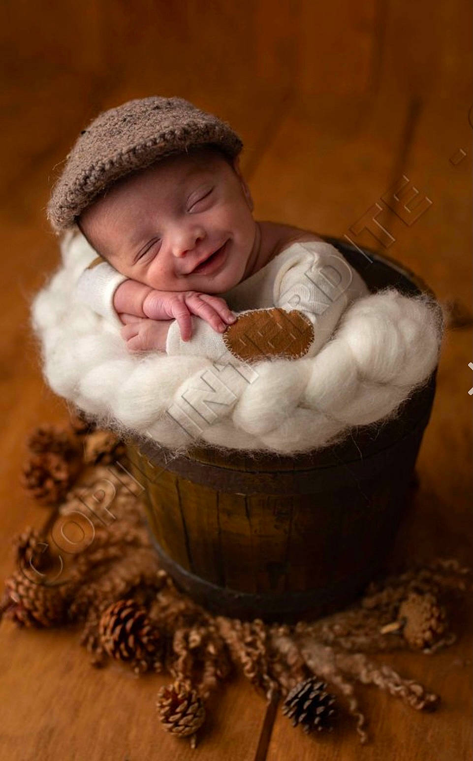 Marvin participe au concours pour gagner de l'argent avec cette photo : baby, baby_sleeping, baby_toddler_clothing, basket, cheek, child, comfort, fur, happy, headwear, joy, knitting, person, portrait_photography, sitting, smile, sweetness, toddler, tree, wicker