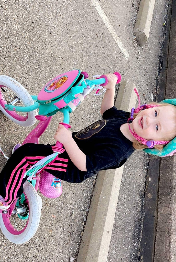 Katerina joined the competition — help win amazing prizes! asphalt, beauty, child, city, fun, green, happy, leisure, magenta, person, pink, recreation, road, sandal, sidewalk, smile, street_fashion, tire, toddler, tree