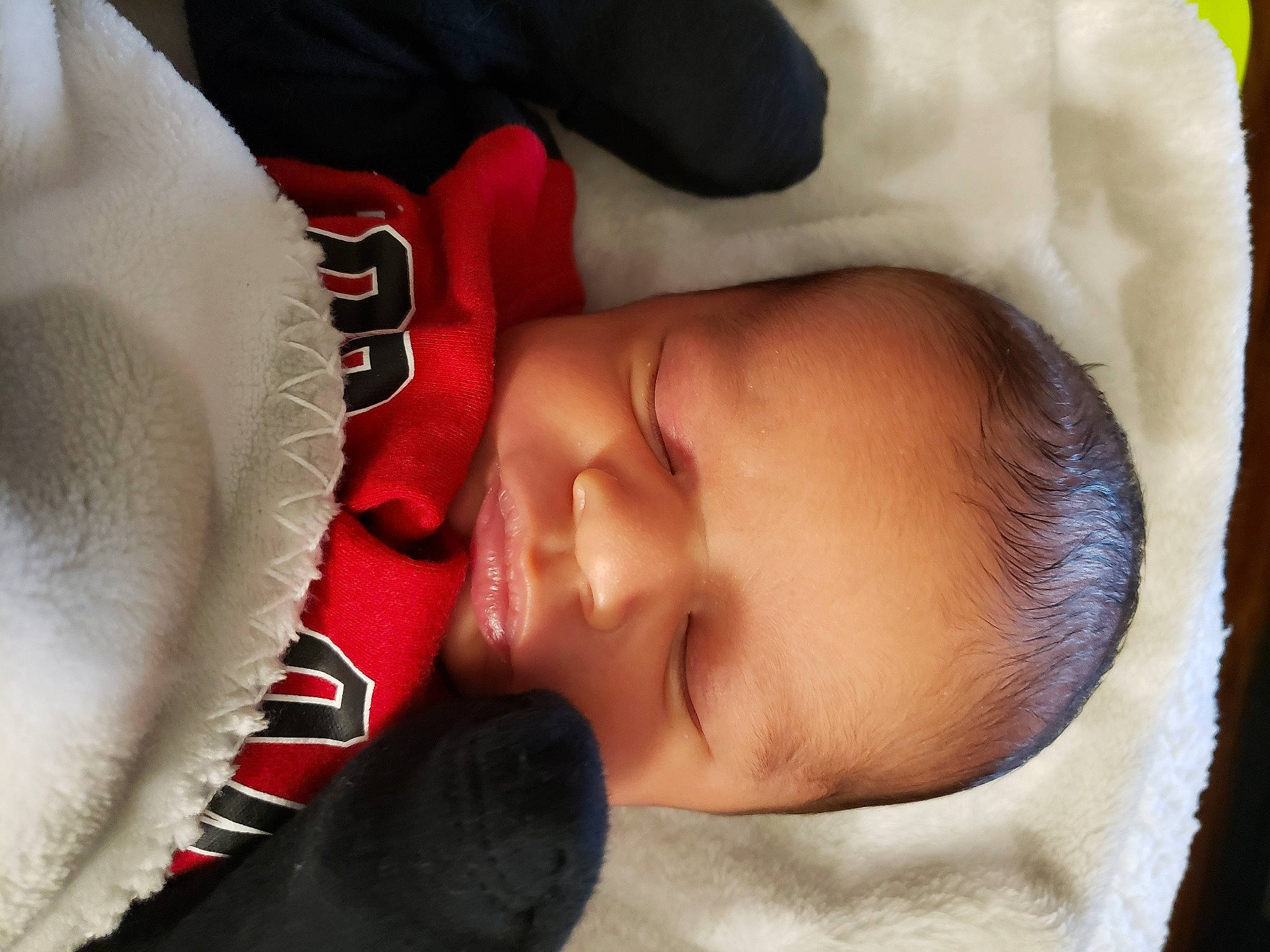 Kieran Julius is registered to the contest to win money with this photo: baby, baby_products, baby_sleeping, baby_toddler_clothing, cheek, child, close_up, comfort, ear, eye, eyebrow, eyelash, head, headgear, lip, mouth, nose, person, skin, textile