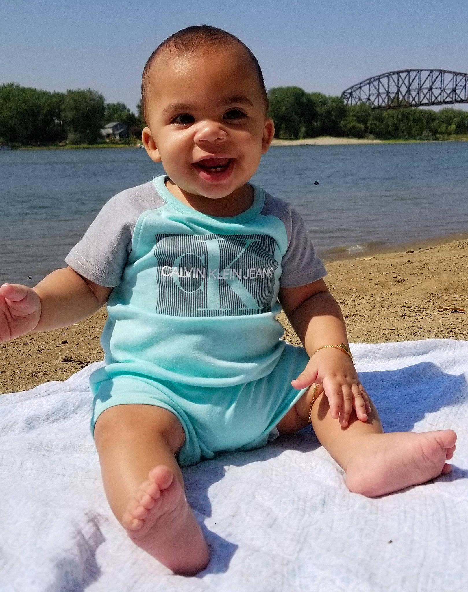 Markeese joined the competition — help win amazing prizes! arm, baby, barefoot, blue, child, cool, fun, hand, joint, joy, leg, person, play, sand, sitting, skin, smile, summer, toddler, turquoise