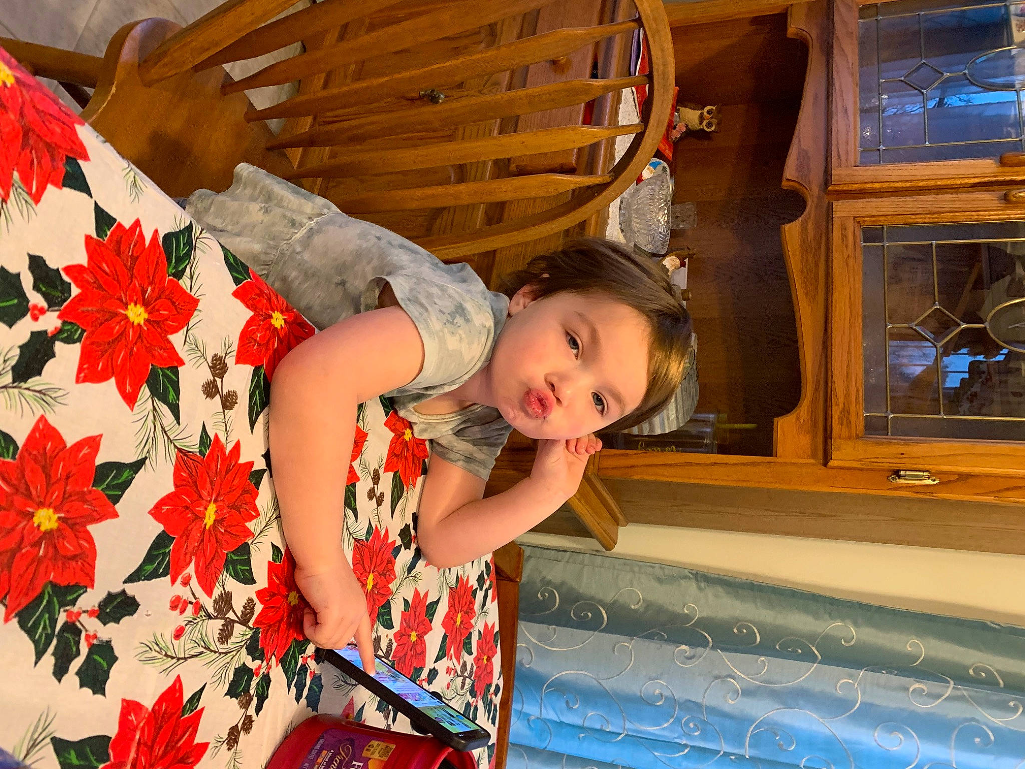 Rosalie is registered to the contest to win money with this photo: carmine, child, coquelicot, floral_design, fun, happy, leisure, orange, pattern, peach, people_in_nature, person, petal, plant, recreation, room, smile, toddler, tree, vacation