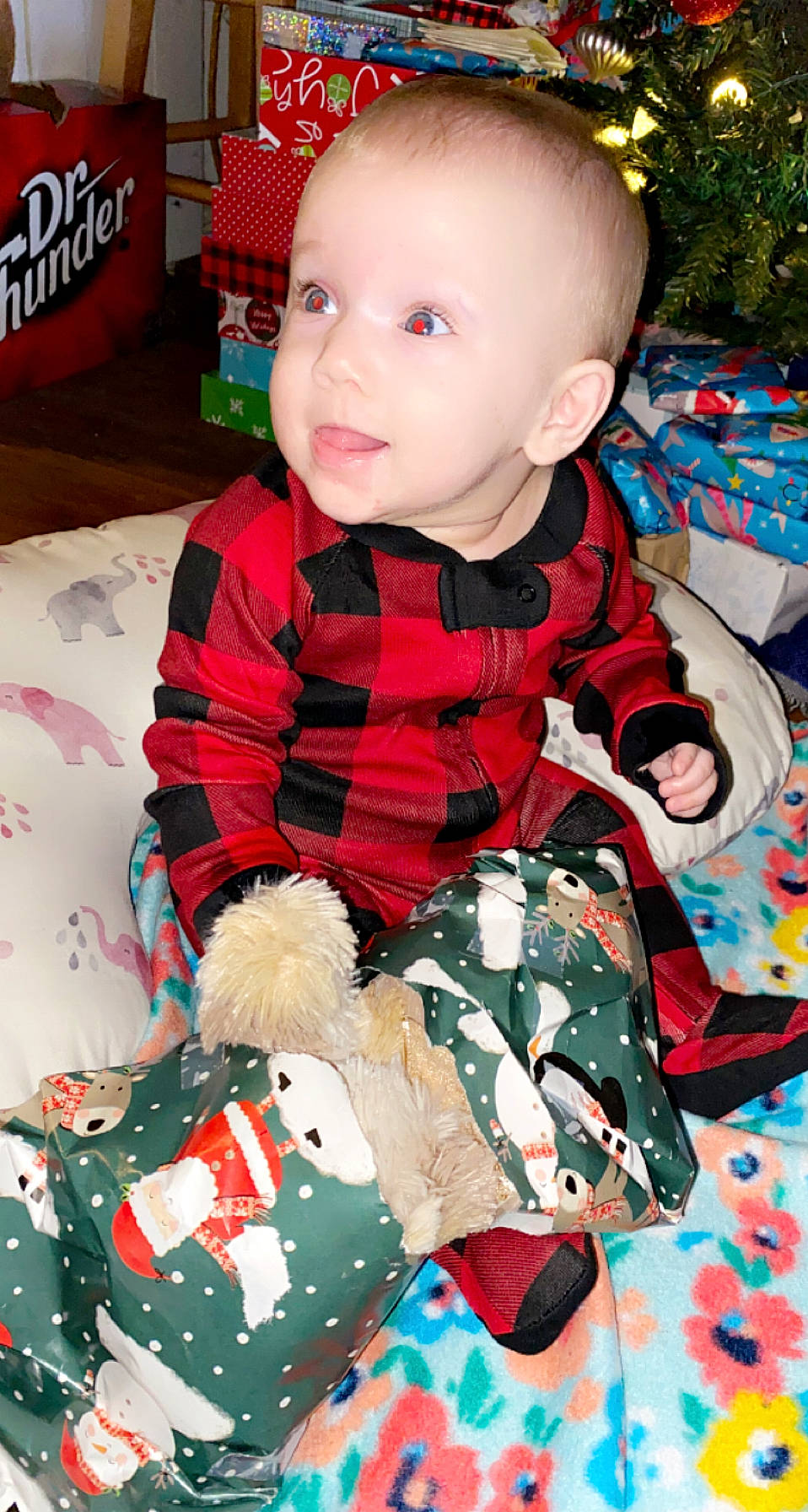 Eliana joined the competition — help win amazing prizes! baby, baby_toddler_clothing, cheek, child, comfort, face, fun, green, head, lap, pattern, person, pink, product, red, sitting, sleeve, sock, t_shirt, textile