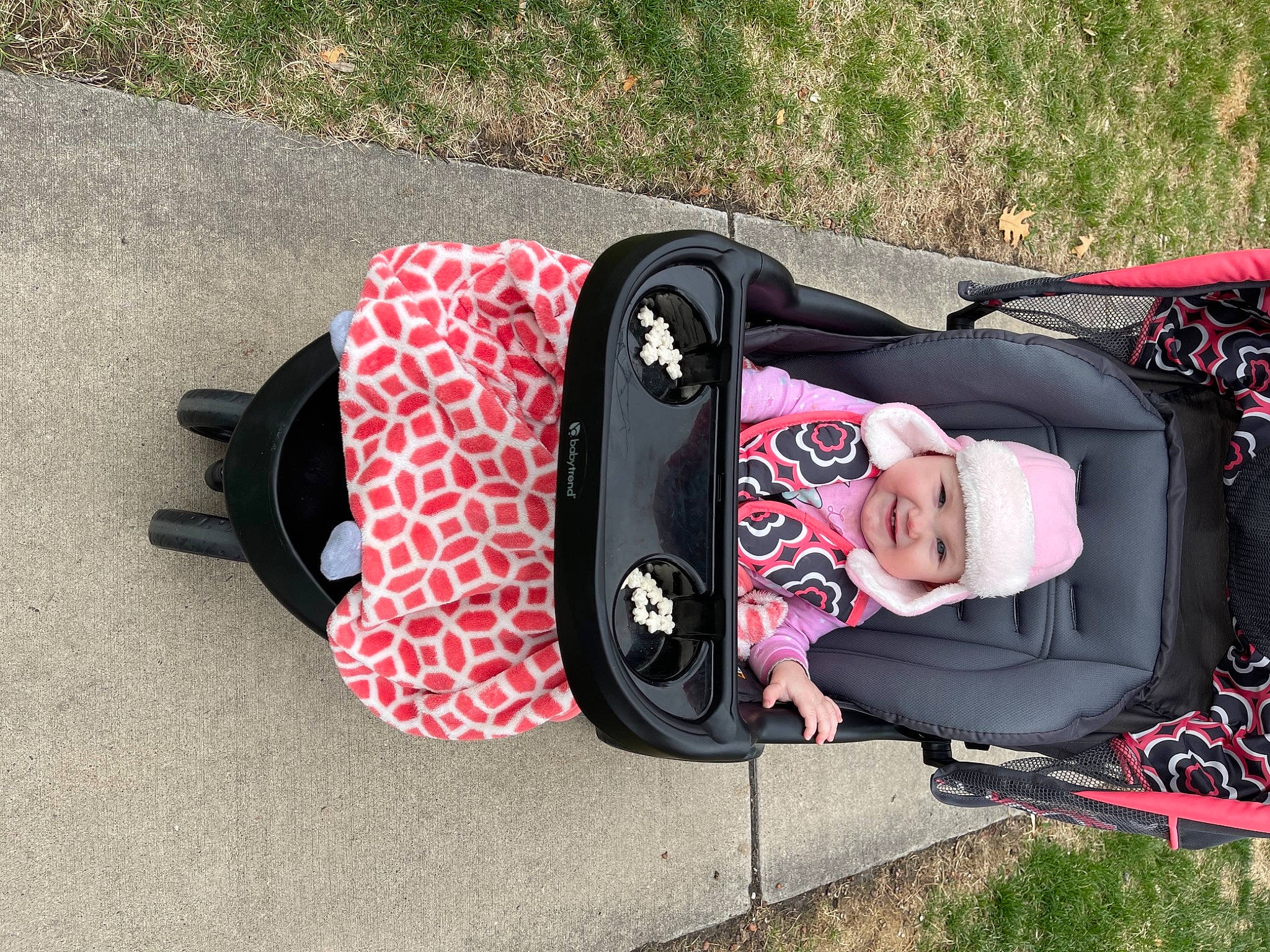 Brooklynn is registered to the contest to win money with this photo: art, auto_part, automotive_design, baby_carriage, baby_products, bag, carmine, fashion_accessory, grass, headgear, headwear, joy, luggage_and_bags, magenta, motor_vehicle, pattern, person, personal_protective_equipment, plant, recreation