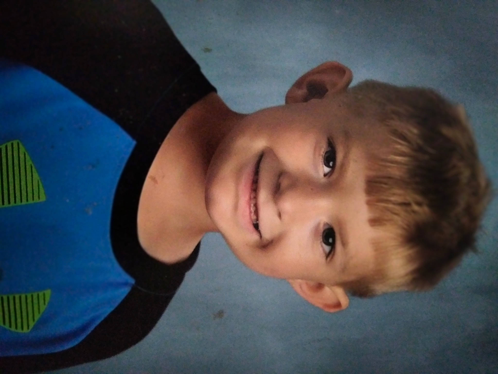 Israel is registered to the contest to win money with this photo: cheek, child, elbow, electric_blue, eyebrow, eyelash, facial_expression, flash_photography, forehead, fun, happy, jaw, joy, lip, mouth, neck, nose, person, portrait_photography, smile