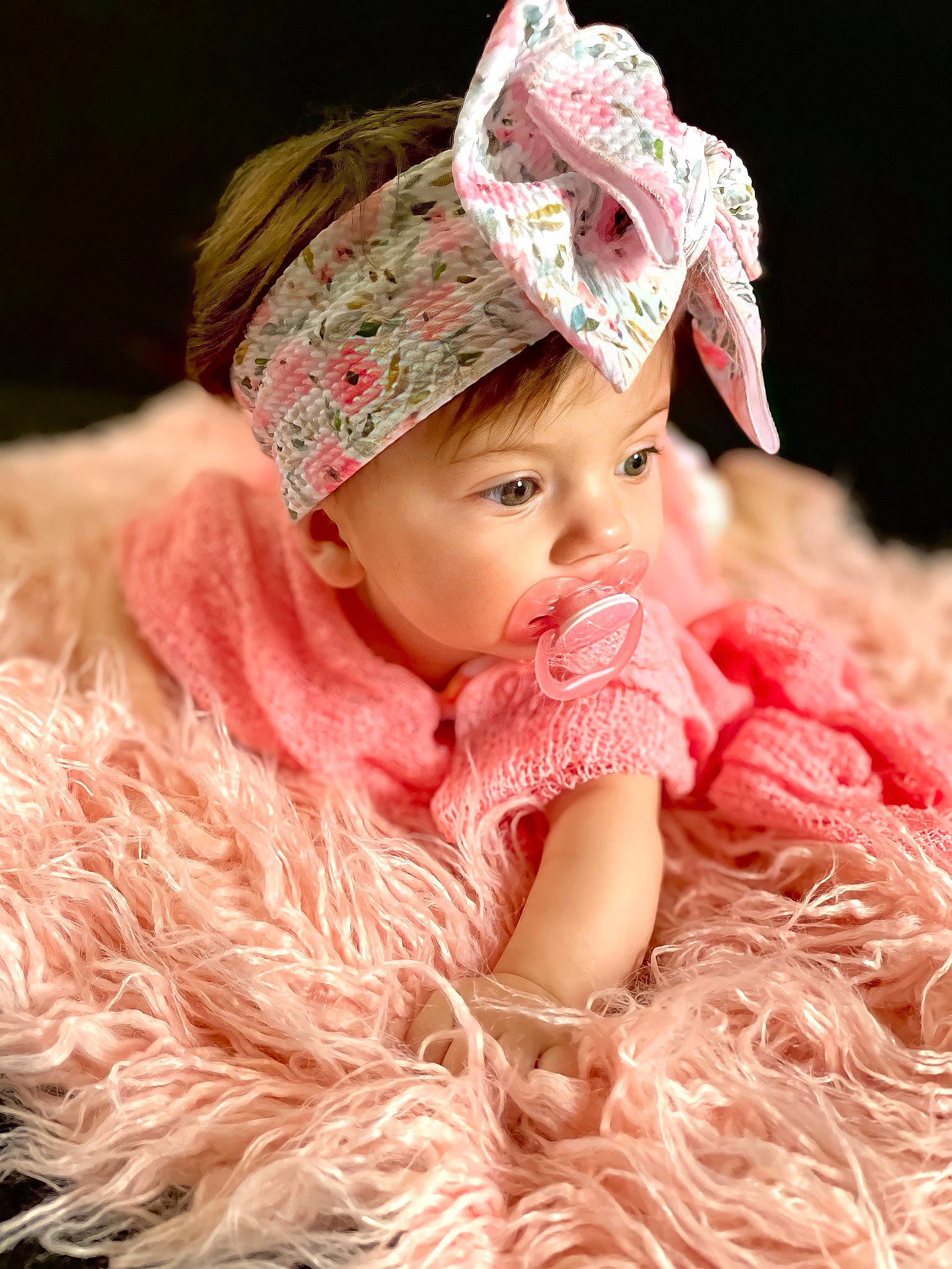 Cora is registered to the contest to win money with this photo: baby, baby_toddler_clothing, cap, child, costume, costume_hat, event, fashion_accessory, grass, happy, headband, headgear, headpiece, headwear, knit_cap, magenta, peach, person, pink, skin