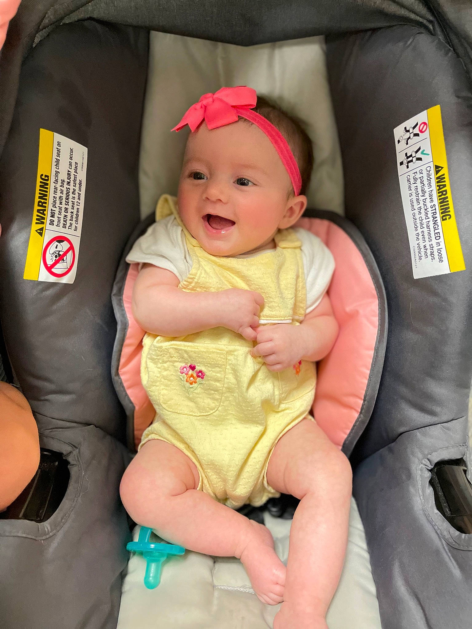 Amelia Summer is registered to the contest to win money with this photo: auto_part, baby, baby_carriage, baby_laughing, baby_products, baby_toddler_clothing, car_seat, chair, child, comfort, event, fun, happy, hat, headwear, lap, person, sitting, smile, thigh