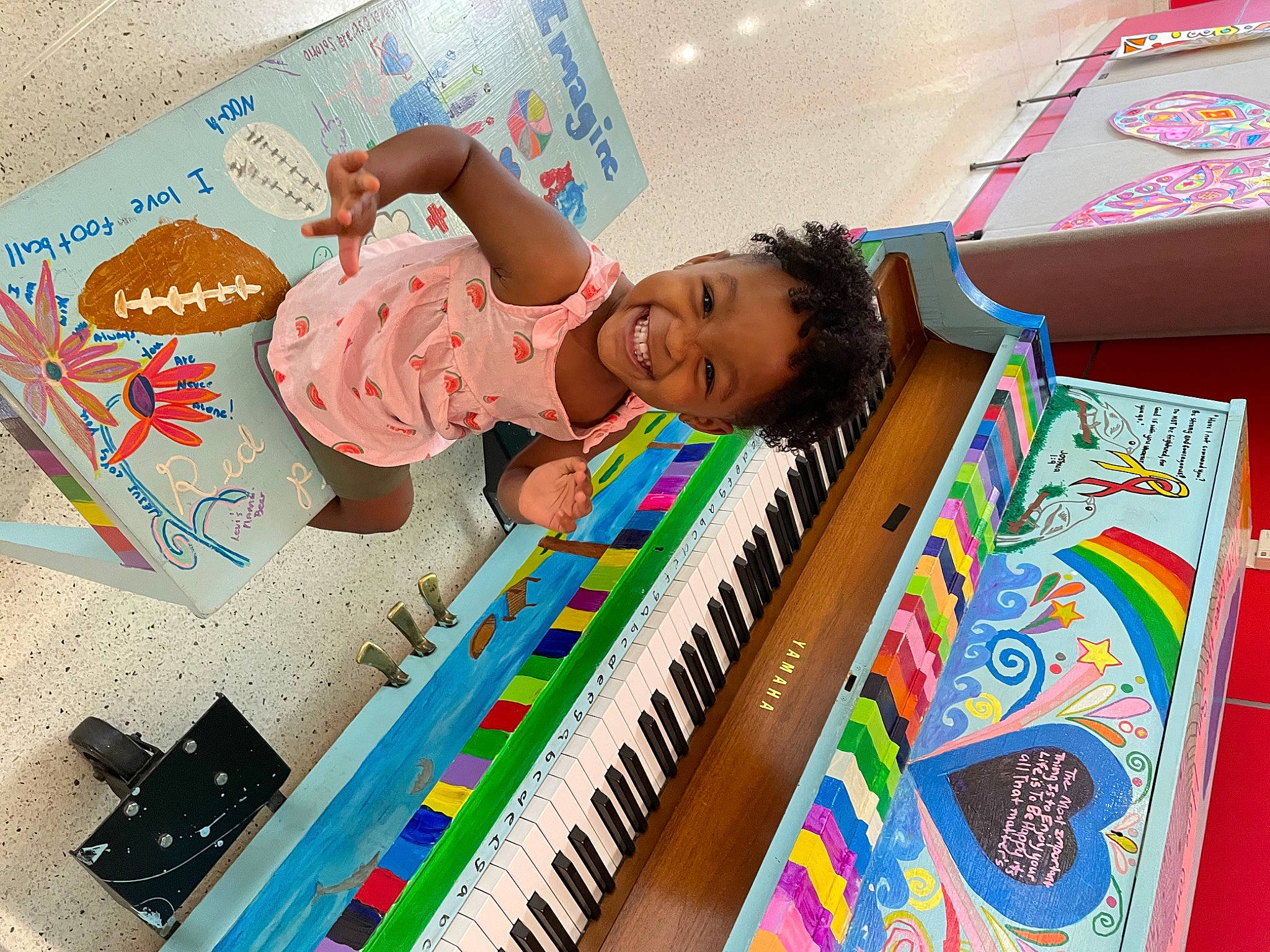 J'Laiya is registered to the contest to win money with this photo: art, child, design, fun, happy, illustration, joy, keyboard, leisure, musical_instrument, musical_keyboard, office_equipment, person, piano, play, product, publication, room, stationery, toddler