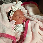 Za'Nyri Tate joined the competition — help win amazing prizes! baby, sleeping, blanket, pink, headband, cute, newborn, face, peaceful, soft, wrapped, infant, adorable, cozy, child, toddler, portrait, indoors, clothing, resting