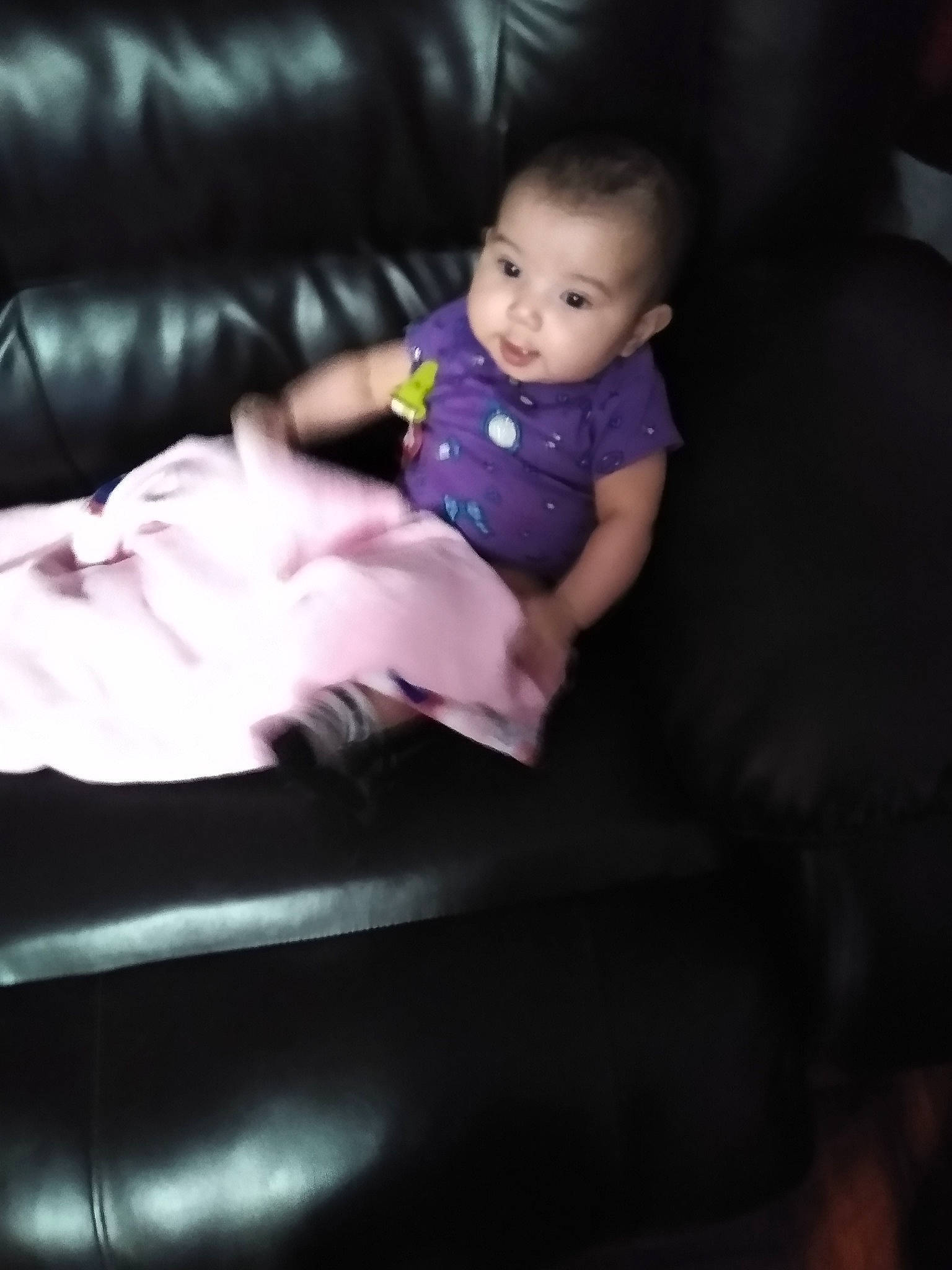 Jazmine is registered to the contest to win money with this photo: baby, baby_toddler_clothing, child, comfort, couch, eye, flash_photography, floor, flooring, head, human_body, human_leg, knee, lap, magenta, person, purple, sock, t_shirt, thigh