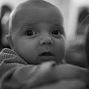 Ayden a rejoint le concours — aidez-le/la à gagner de superbes lots ! baby, black_and_white, cheeks, child, close_up, cute, expression, eyes, face, gaze, hand, head, holding, indoor, infant, newborn, person, portrait, soft_focus, sweater