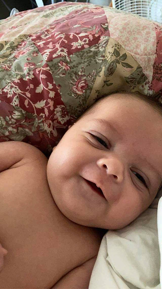 Jesse Kolton joined the competition — help win amazing prizes! baby, cheek, child, chin, close_up, eye, eyebrow, forehead, gesture, happy, head, iris, lip, mouth, nose, person, pink, skin, smile, textile