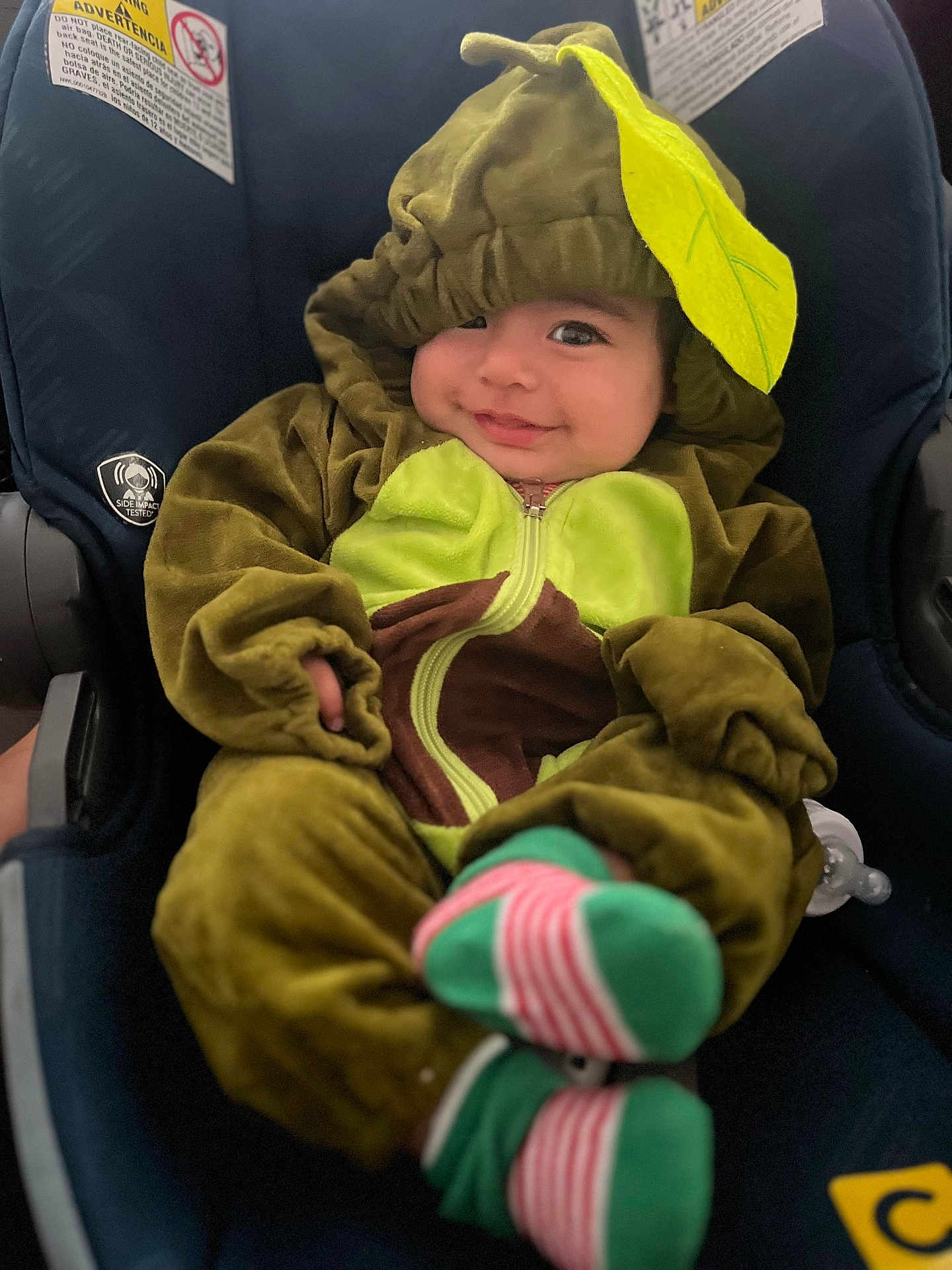 Kenaz joined the competition — help win amazing prizes! baby, child, smile, costume, green, leaf, hood, car_seat, socks, pacifier, cute, infant, clothing, seat, happy, indoors, portrait, person, young, cozy