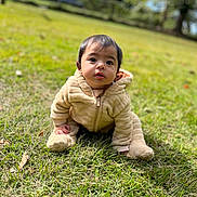 Kenaz joined the competition — help win amazing prizes! baby, child, grass, outdoor, nature, cute, onesie, infant, portrait, young, sitting, greenery, curious, face, person, clothing, daylight, soft, young_child, casual