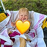 baby, child, colorful, cute, fun, grass, happy, outdoor, person, playground, relaxing, seat, smile, striped, summer, swing, towel, wet_hair, wrapped, young_child