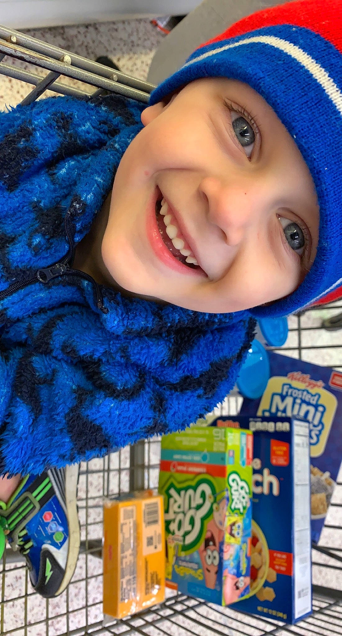 Nathaniel is registered to the contest to win money with this photo: blue, cheek, child, cool, electric_blue, fashion_accessory, fun, happy, headgear, headwear, joy, junk_food, knit_cap, leisure, lip, mouth, nose, outerwear, person, play