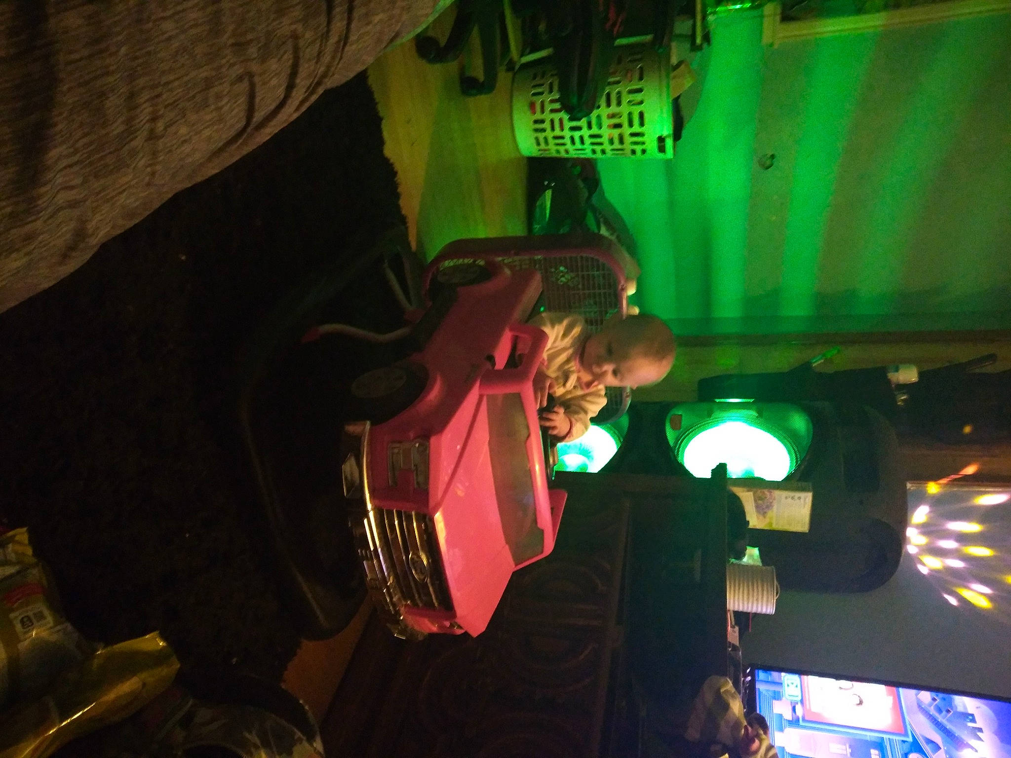 Rosalyn is registered to the contest to win money with this photo: darkness, display_device, entertainment, event, fictional_character, fun, games, hat, leisure, machine, microphone, music_venue, night, person, pub, recreation, room, visual_effect_lighting