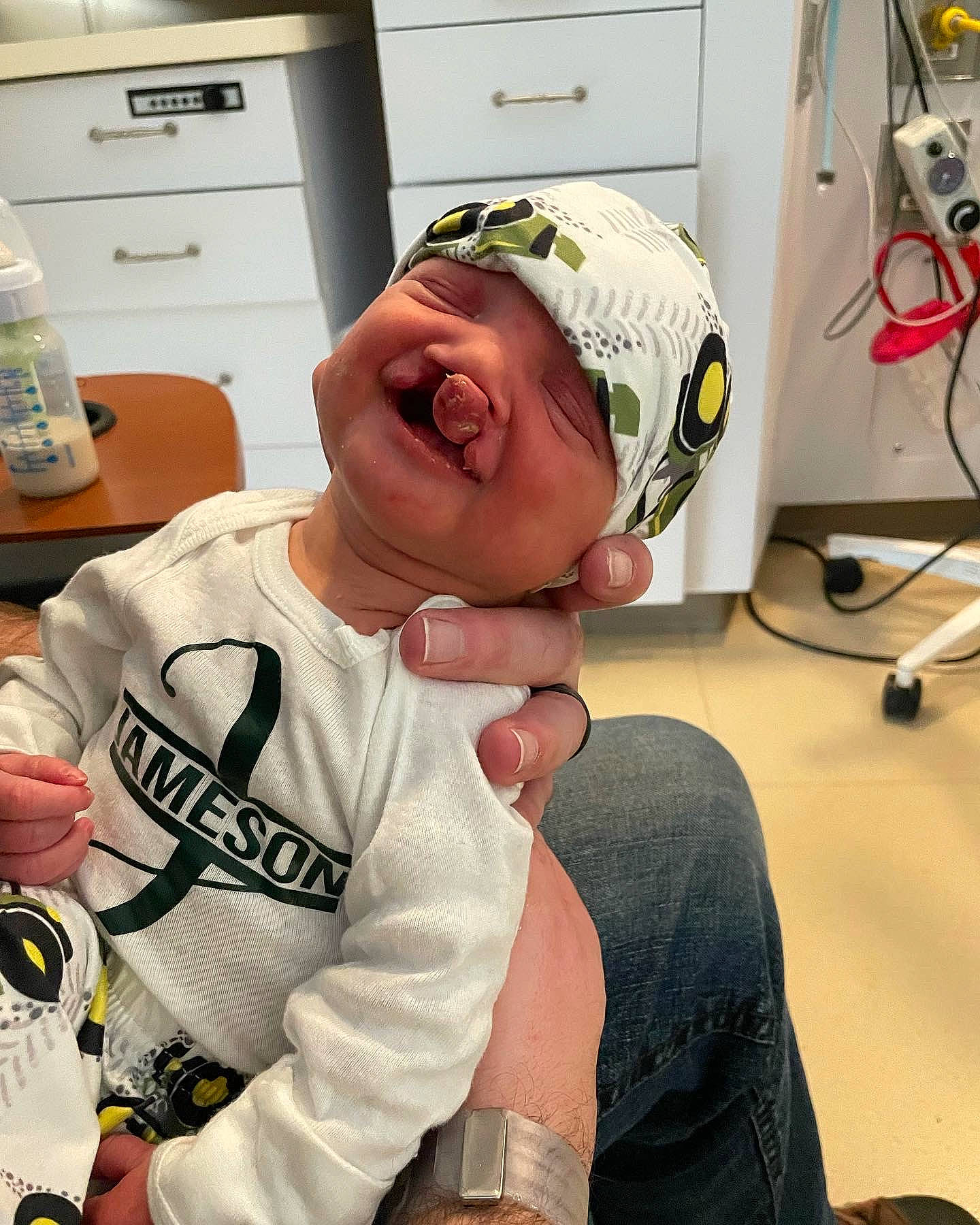 Jameson joined the competition — help win amazing prizes! arm, audio_equipment, baseball_cap, cabinetry, cap, child, elbow, eyewear, fun, headwear, home_appliance, kitchen_appliance, mouth, person, personal_protective_equipment, refrigerator, room, sleeve, smile, sports_gear