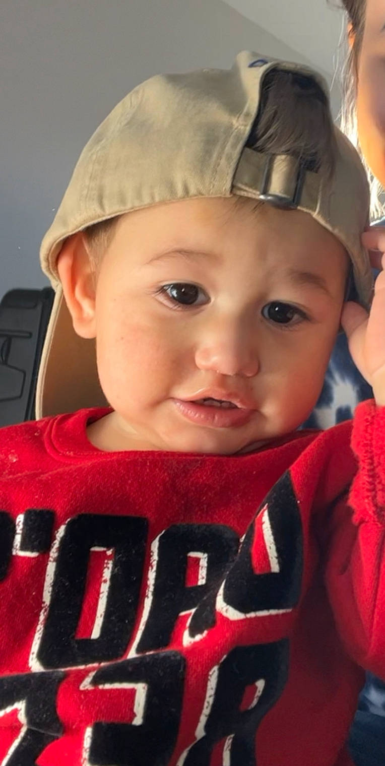 Bodhi joined the competition — help win amazing prizes! baby, cap, cheek, child, chin, eye, eyebrow, eyelash, facial_expression, hairstyle, happy, headwear, lip, mouth, organ, people, person, pink, product, skin