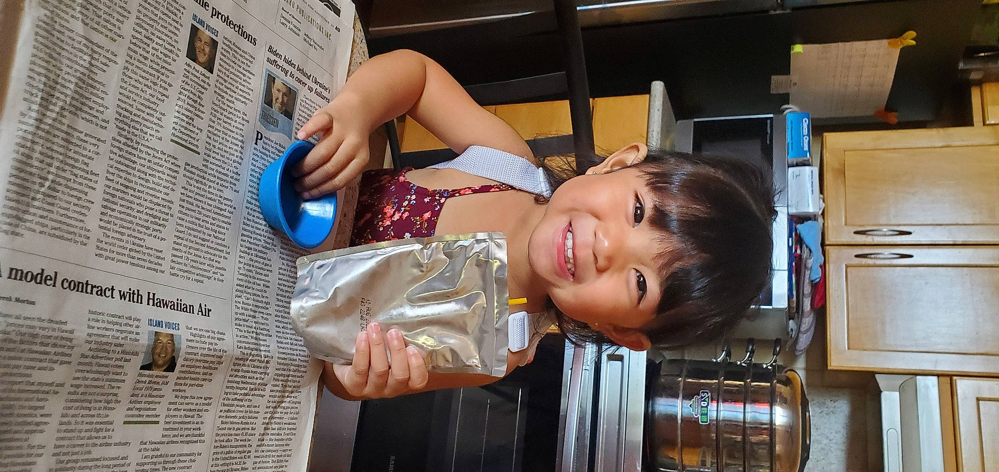 Sharmill is registered to the contest to win money with this photo: abdomen, arm, child, fast_food, fun, happy, human_leg, joy, nail, person, room, shelf, skin, smile, thigh, toddler, vacation, wood, wrist