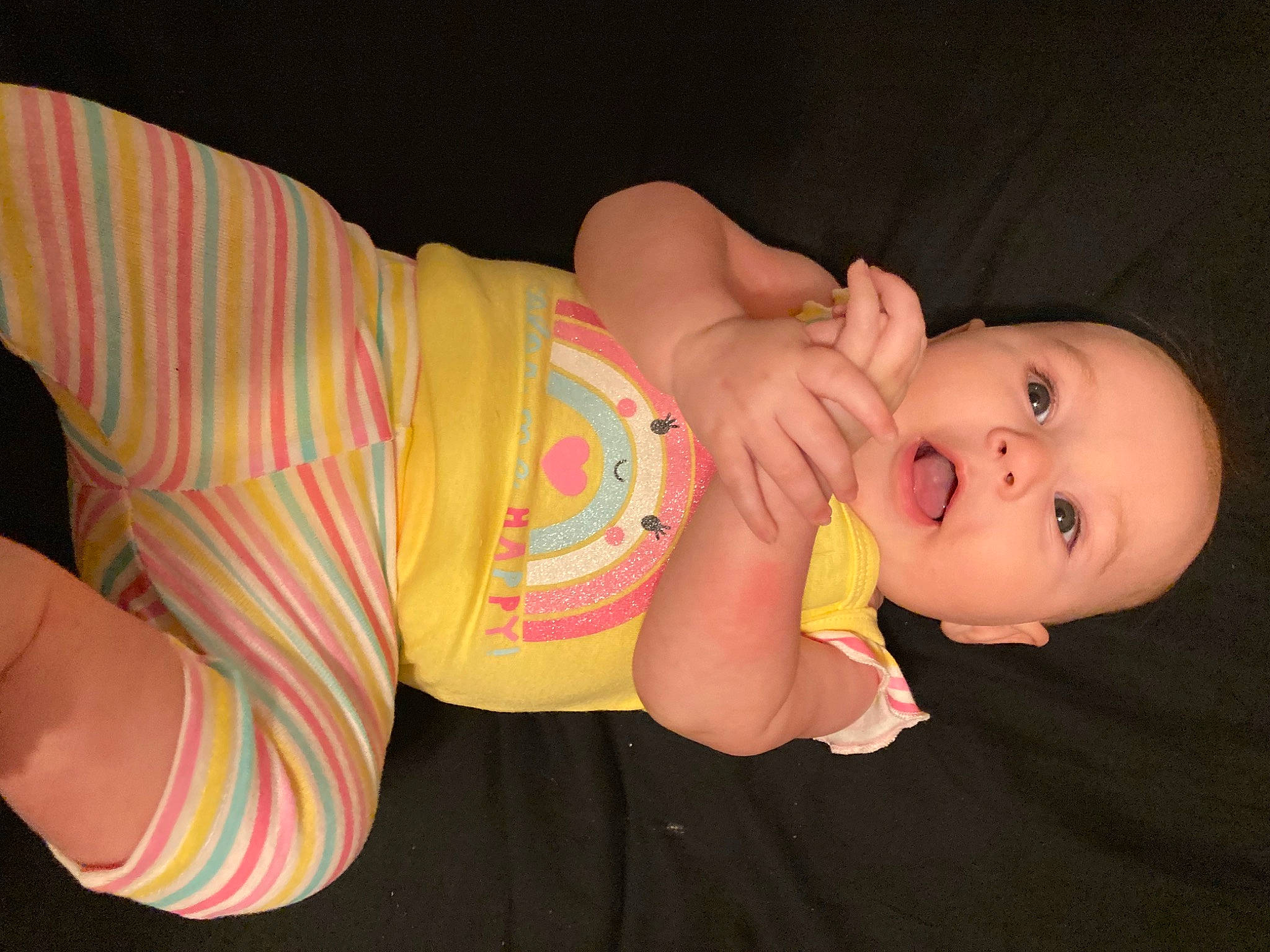 Zara is registered to the contest to win money with this photo: abdomen, baby, baby_products, baby_toddler_clothing, cheek, chest, elbow, finger, headgear, human_body, nail, neck, pattern, person, pink, skin, sleeve, stomach, thigh, toddler