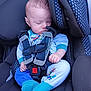 baby, car, car_interior, carseat, clothing, coat, cushion, face, glove, head, homedecor, jacket, lifejacket, pants, person, photography, portrait, transportation, vehicle, vest