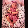 baby, sleeping, pink, headband, floral, cushion, blanket, pattern, infant, peaceful, cozy, cute, child, newborn, resting, soft, clothing, indoors, portrait, relaxation