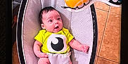 Delilah P. joined the competition — help win amazing prizes! baby, infant, baby_swing, yellow_shirt, toy, colorful_toys, floor, tile_floor, indoor, cute, child, playtime, happy, person, small_person, home, relaxing, seat, smiling, looking_up