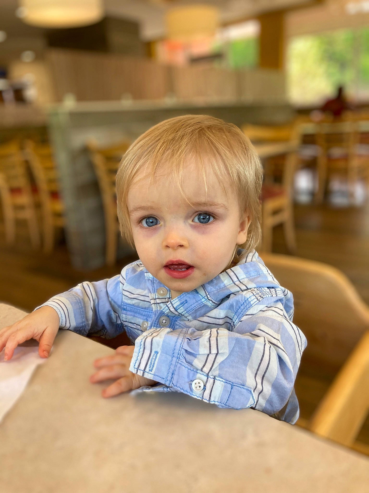 Cyrus joined the competition — help win amazing prizes! baby, baby_toddler_clothing, blond, chair, cheek, child, flooring, fun, happy, hardwood, leisure, person, portrait_photography, room, shelf, sitting, table, toddler, vacation, wood
