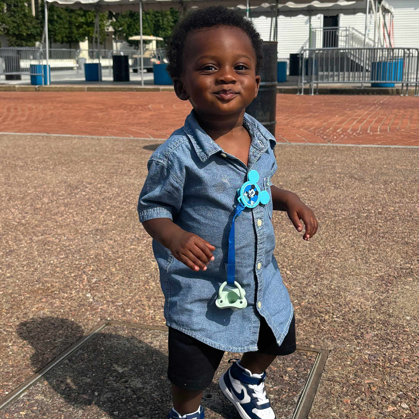 Enaji Marshall joined the competition — help win amazing prizes! boy, bus, child, clothing, face, footwear, happy, head, male, pants, person, photography, portrait, shoe, shorts, sitting, smile, sneaker, transportation, vehicle