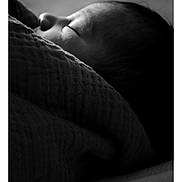 River is registered to the contest to win money with this photo: baby, sleeping, black_and_white, blanket, close_up, face, infant, peaceful, portrait, soft_lighting, texture, wrapped, newborn, quiet, rest, cozy, calm, child, monochrome, sleep
