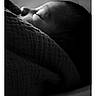 baby, sleeping, black_and_white, blanket, close_up, face, infant, peaceful, portrait, soft_lighting, texture, wrapped, newborn, quiet, rest, cozy, calm, child, monochrome, sleep