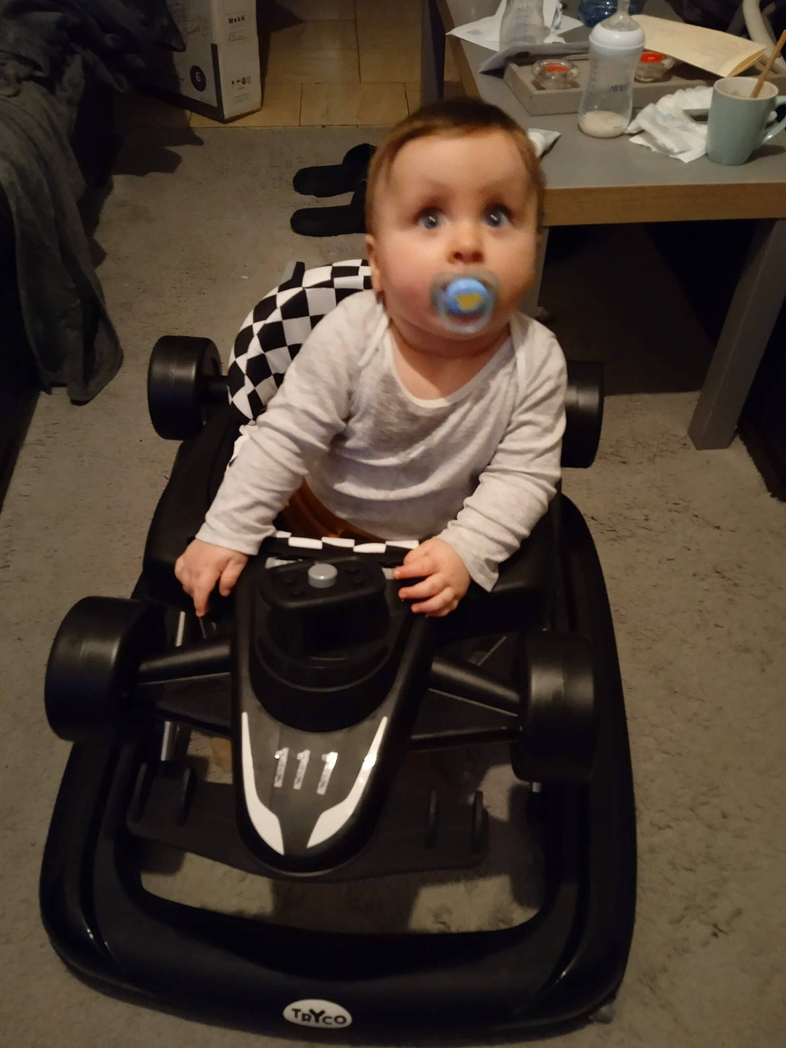 Kirill participe au concours pour gagner de l'argent avec cette photo : automotive_design, automotive_exterior, automotive_tire, automotive_wheel_system, baby, baby_toddler_clothing, bumper, chair, comfort, flooring, go_kart, motor_vehicle, person, riding_toy, sitting, surprise, tableware, tire, toddler, toy