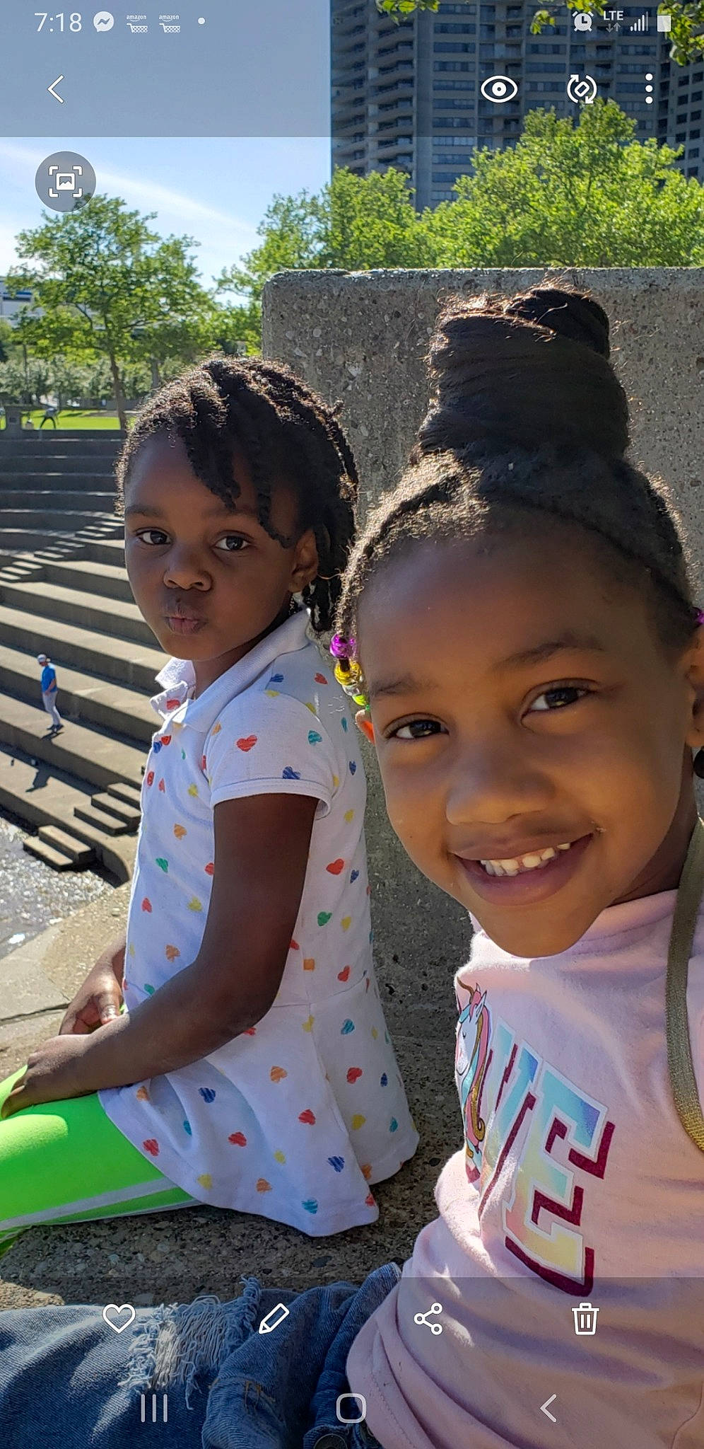 Cheyenne is registered to the contest to win money with this photo: adaptation, afro, child, event, fun, grass, hairstyle, happy, headwear, joy, leisure, person, play, recreation, sitting, skin, smile, summer, t_shirt, toddler