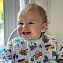 Leo a rejoint le concours — aidez-le/la à gagner de superbes lots ! toddler, child, smiling, baby, bib, high_chair, construction_vehicles, indoor, window, happy, cute, face, clothing, portrait, sitting, young_child, light, colorful, person, cheerful