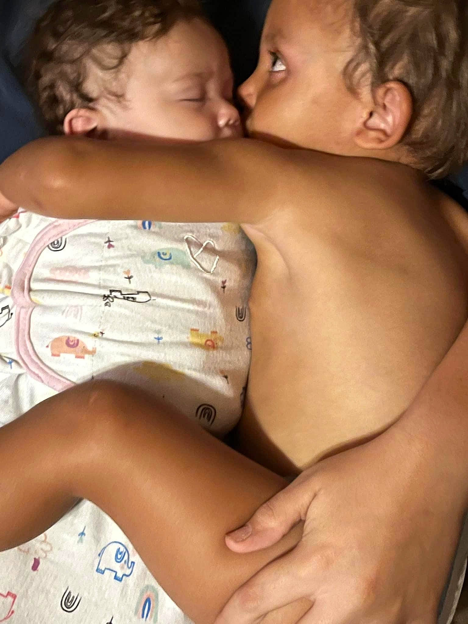 Kyrie is registered to the contest to win money with this photo: abdomen, arm, black_hair, chest, finger, gesture, happy, human_body, joint, leg, lip, muscle, neck, organ, person, skin, stomach, thigh, trunk, undergarment