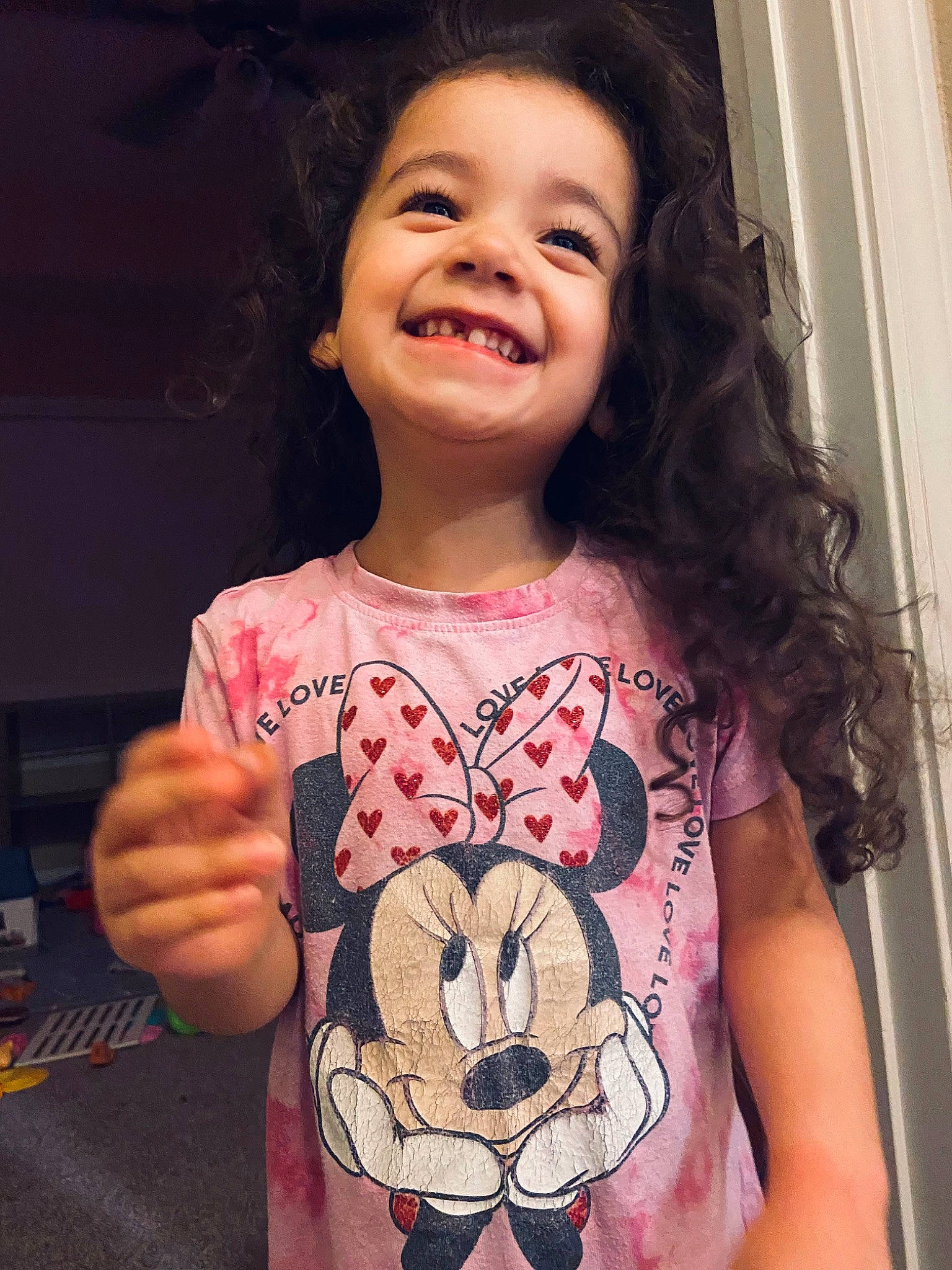 Lilian is registered to the contest to win money with this photo: baby_toddler_clothing, cool, dress, eyelash, facial_expression, finger, hair, hairstyle, happy, head, human_body, iris, joy, mouth, neck, organ, person, pink, plant, shoulder