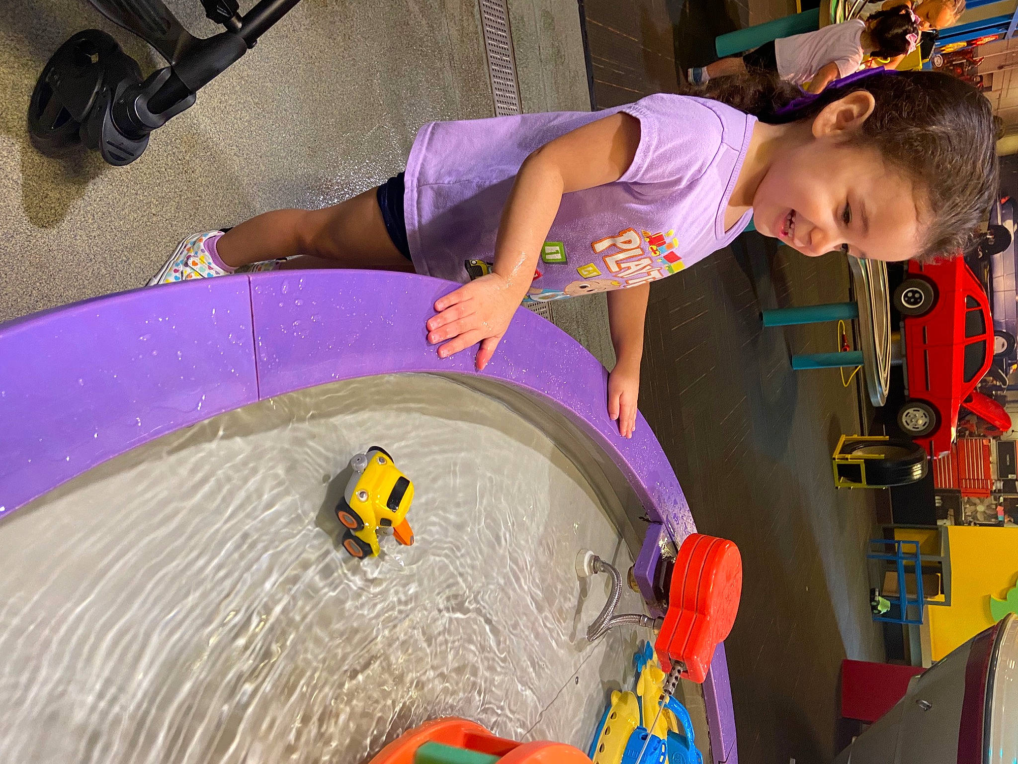 Lilian joined the competition — help win amazing prizes! automotive_tire, automotive_wheel_system, child, circle, flooring, fun, games, human_leg, joy, leisure, pattern, person, play, product, public_space, purple, recreation, tire, toddler, toy