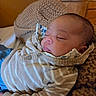 Mary joined the competition — help win amazing prizes! newborn, baby, sleeping, infant, portrait, face, closed_eyes, cozy, blanket, knit, clothing, onesie, indoors, bedroom, bed, pillows, warm_lighting, peaceful, cuddled, photography