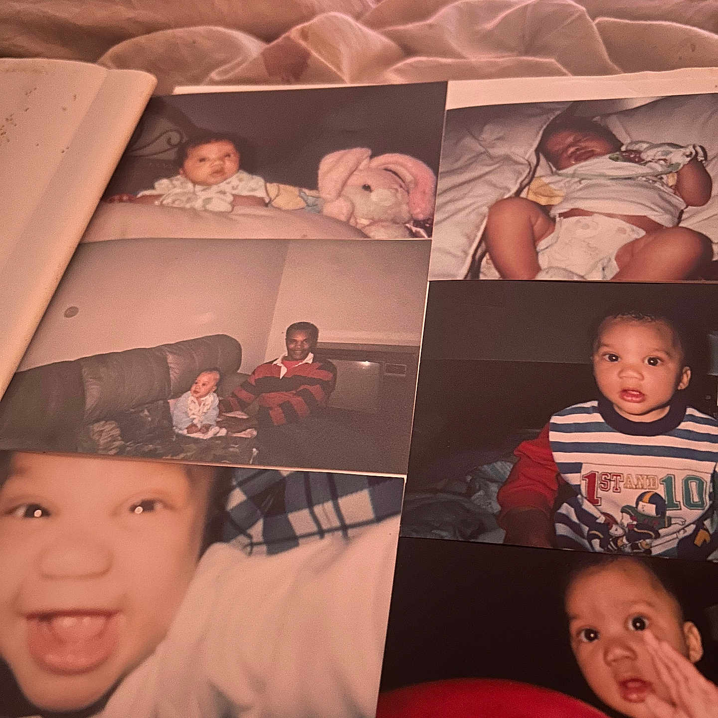 Winston Brown is registered to the contest to win money with this photo: adult, album, baby, bed, blanket, child, close_up, clothing, couch, diaper, family, happy, indoor, nostalgia, person, photograph, plush_toy, portrait, smile, toddler