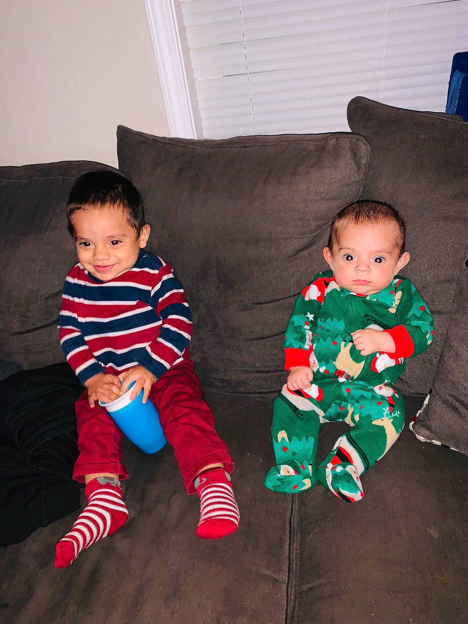 Ezekiel joined the competition — help win amazing prizes! baby, baby_toddler_clothing, comfort, couch, facial_expression, flooring, fun, happy, holiday, iris, joy, lap, living_room, pattern, person, sitting, skin, sleeve, smile, standing