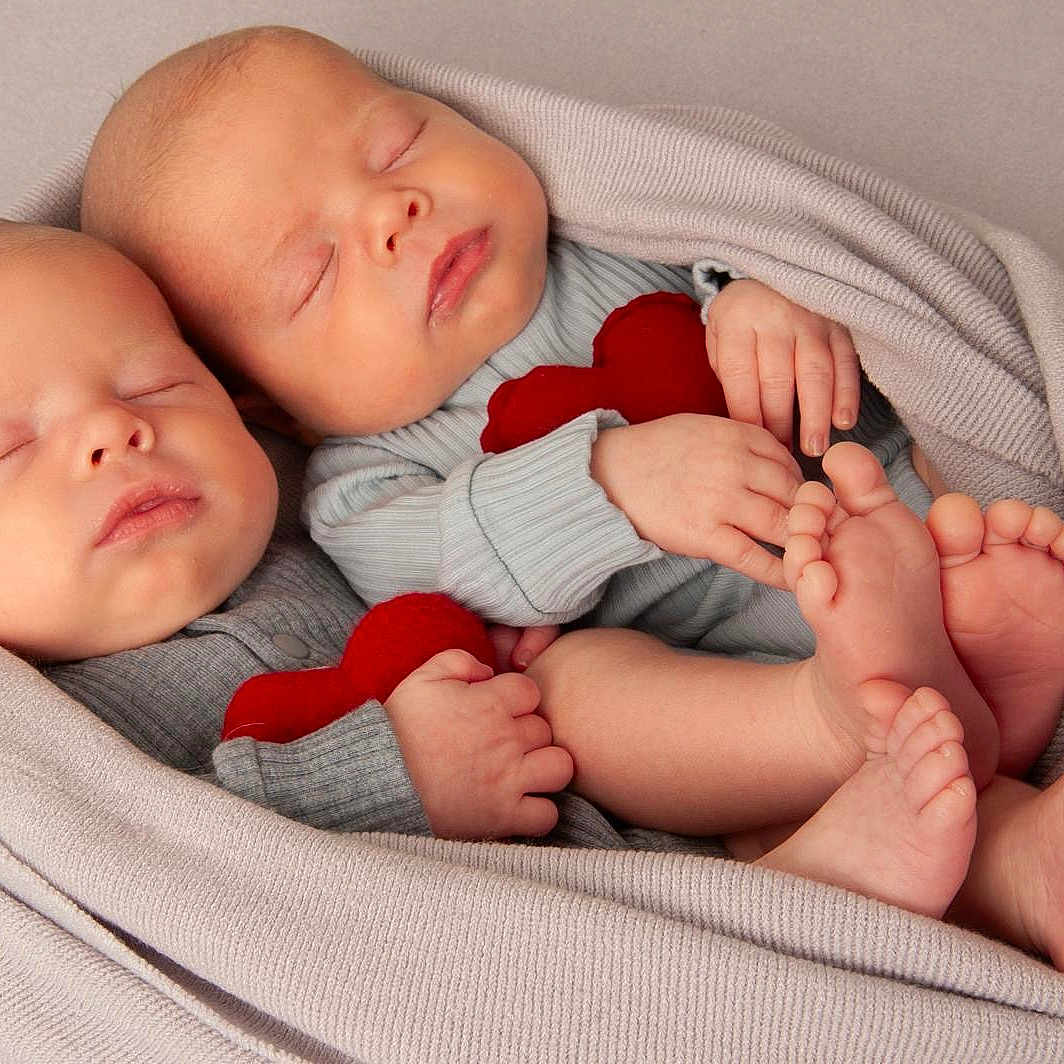 Hudson And Harlow is registered to the contest to win money with this photo: baby, bed, bedroom, blanket, clothing, face, furniture, head, hosiery, indoors, newborn, people, person, photography, portrait, quilt, room, sleeping, sock